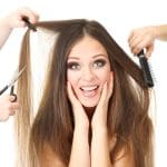 Woman with long hair in beauty salon, isolated on white