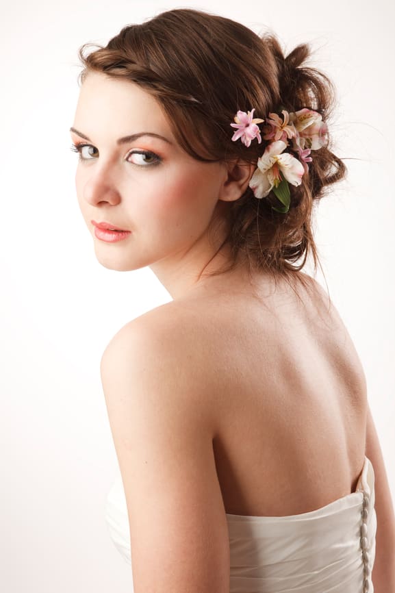 Bride glanses over her shoulder